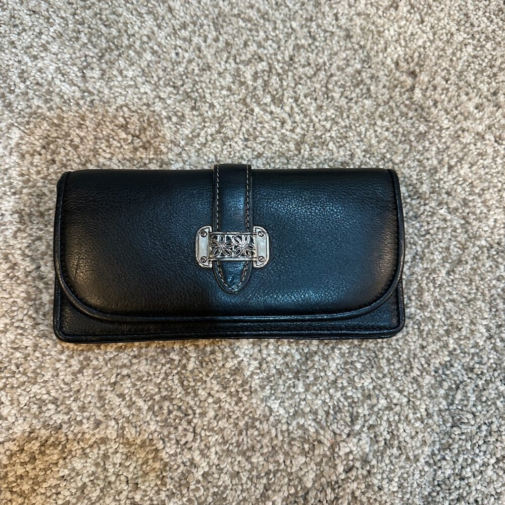 Black leather wallet with zipper closure